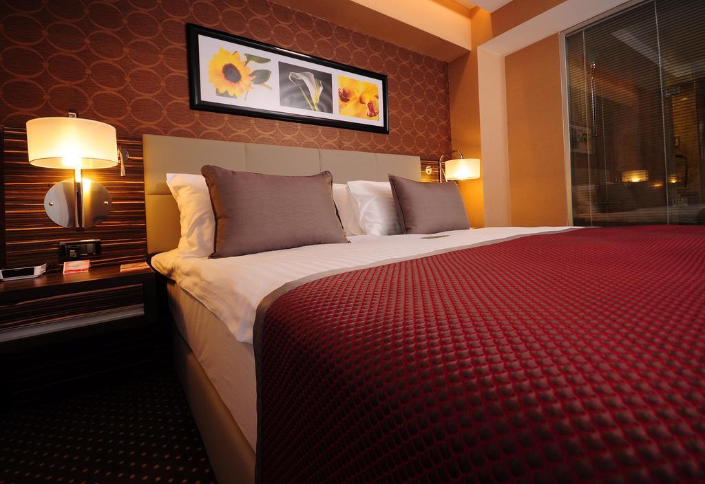 Hotel Ramada Plaza By Wyndham Izmit Kocaeli Exterior foto A bedroom